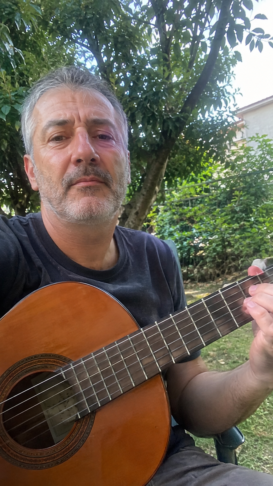 Ray H., 55, Texas practising guitar
