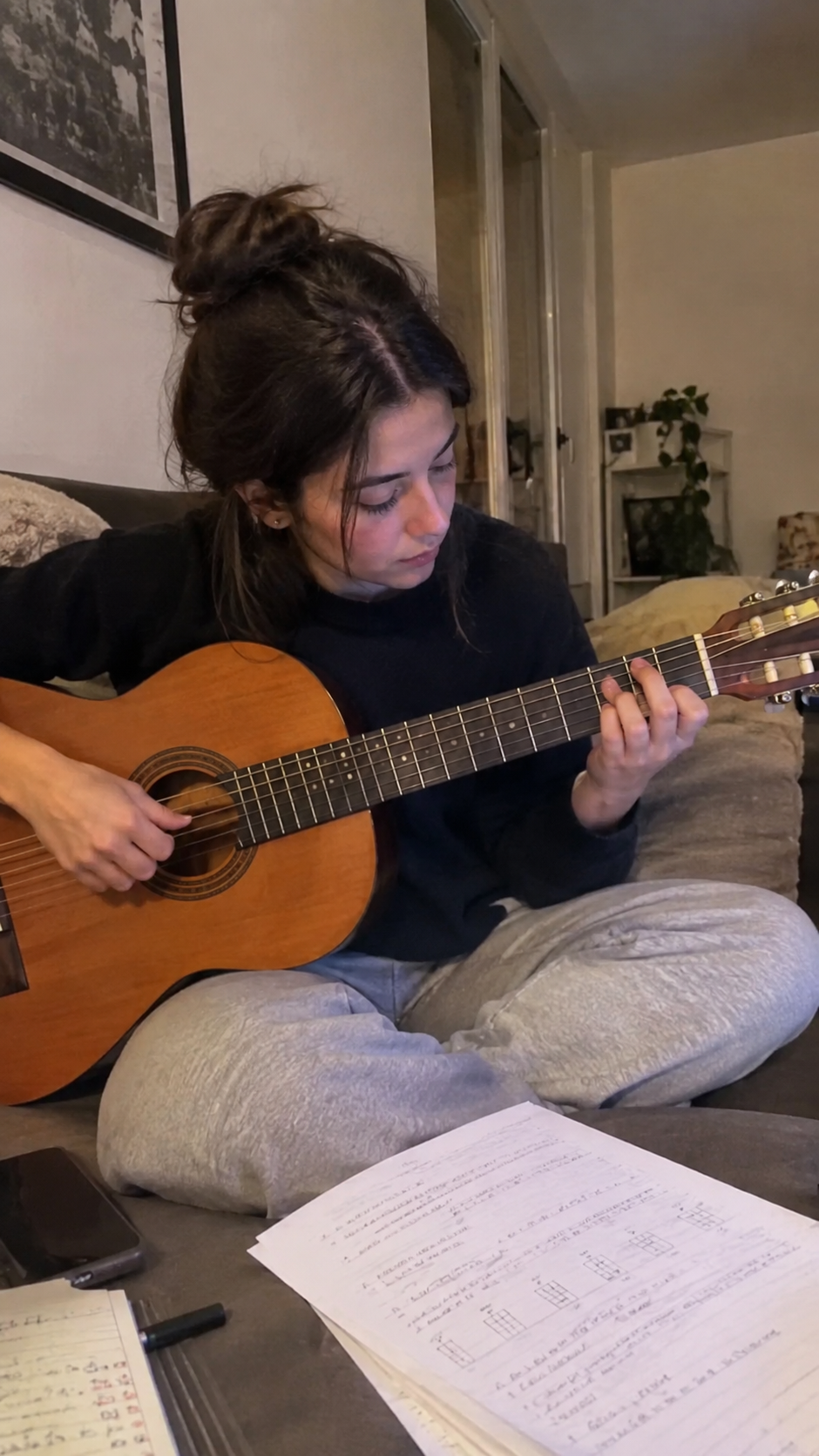 Chloe M., 20, Australia practising guitar